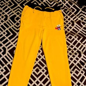 Nike medium yellow & black sweat pants